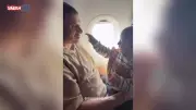 Minik Atlas'ın Uçakta Babasını Besleme Anı Sosyal Medyayı Salladı