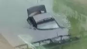 Adana'da Kontrolden Çıkan Otomobil Sulama Kanalına Düştü, Sürücü Yaralanmadan Kurtuldu