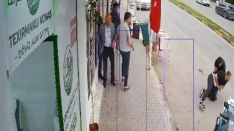 Hatay'da döviz bürosuna silahlı saldırı anı kamerada: Boğuşma ve öpücük