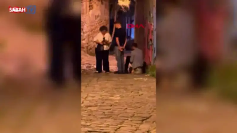 Galata'da fırça düşürme dolandırıcılığı: Turist kadını diğer turistler kurtardı
